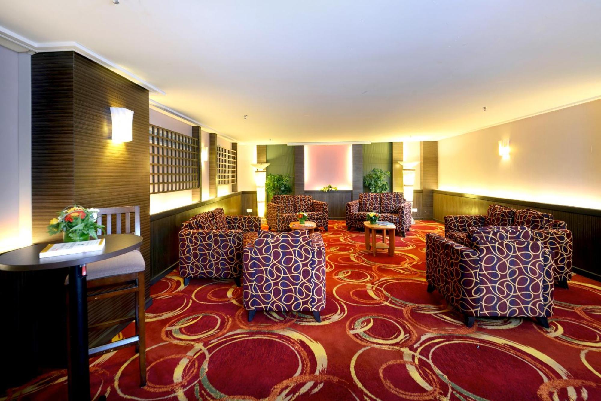Отель Grand Lexis Порт-Диксон Экстерьер фото The lounge at the airport